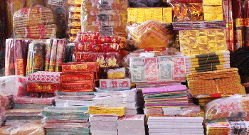 Traditional shop of votive papers products Burning votive papers in Vietnam